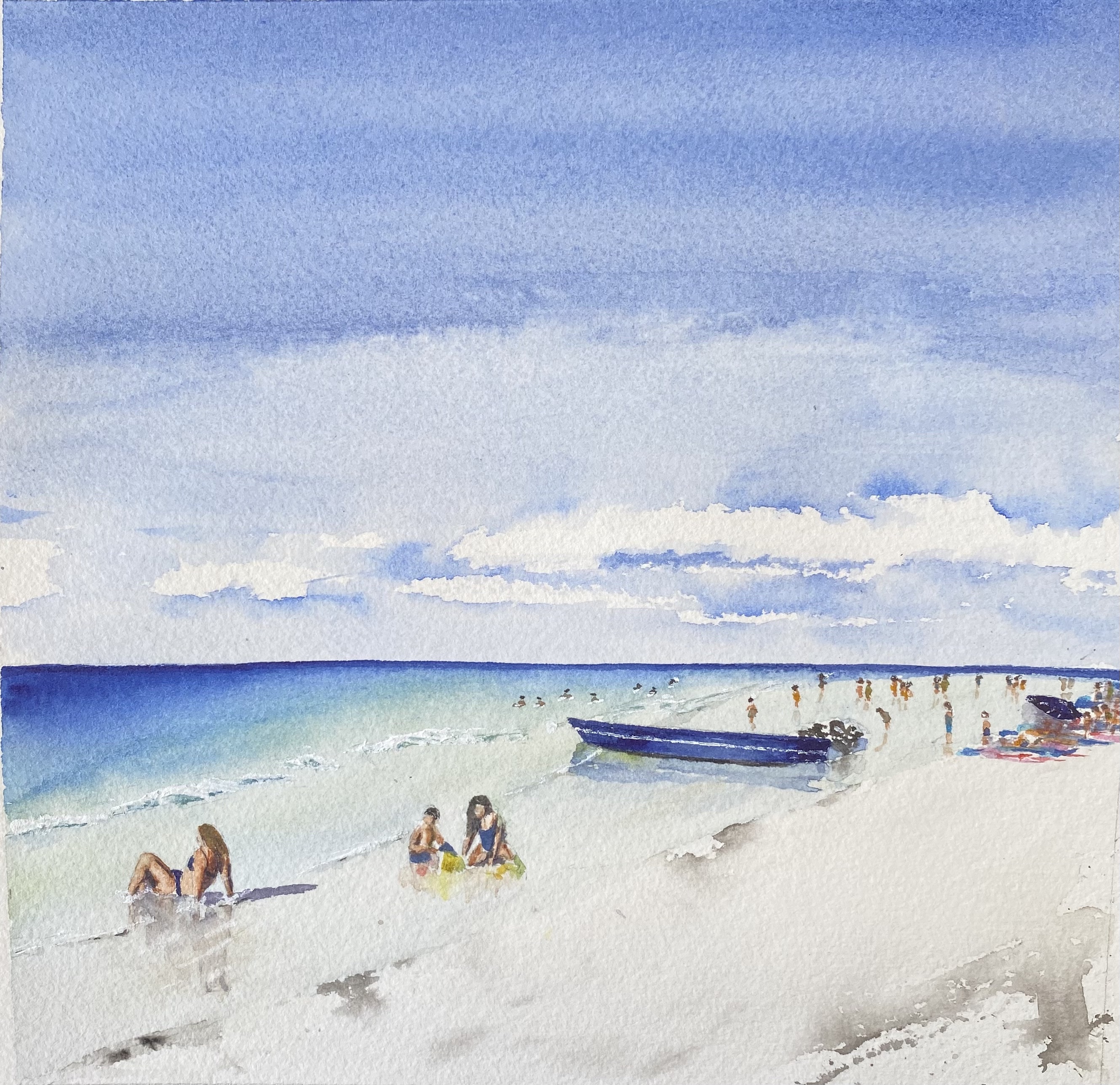 Petite barque bleue sur la plage